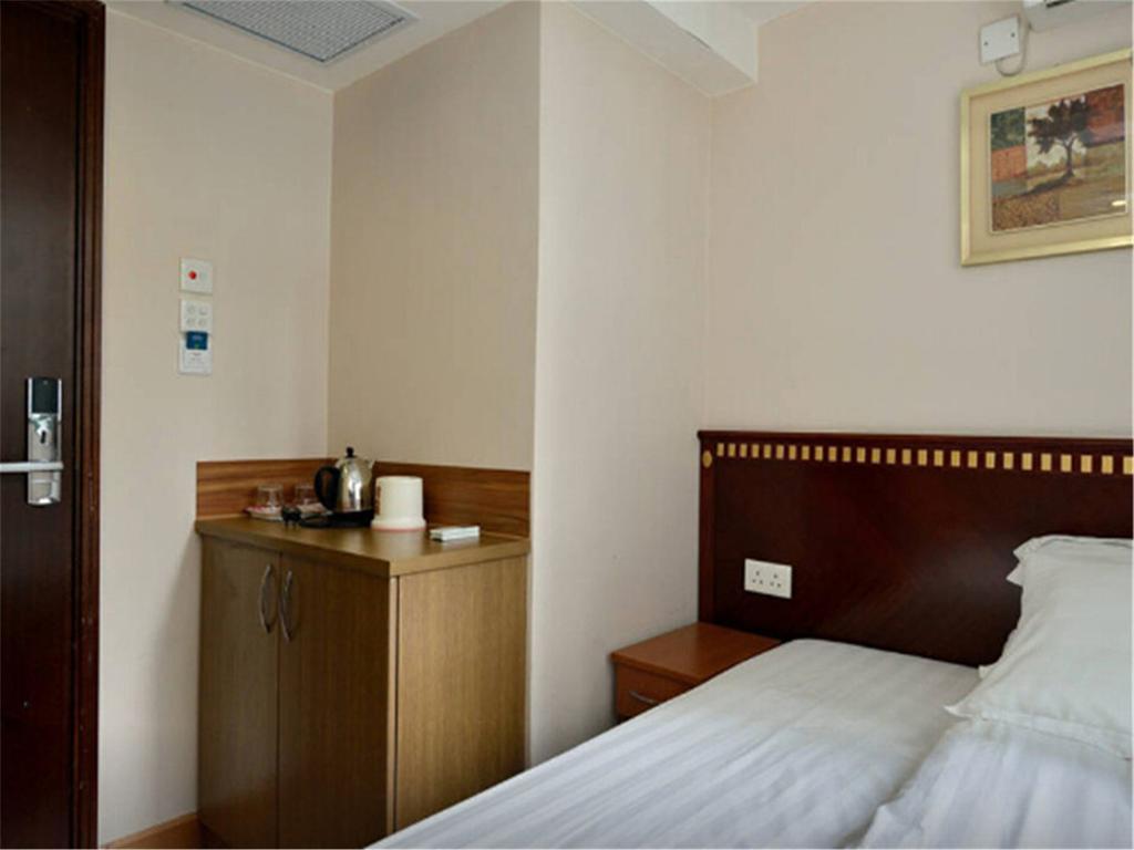 Mingdu Hostel Цзюлун Экстерьер фото