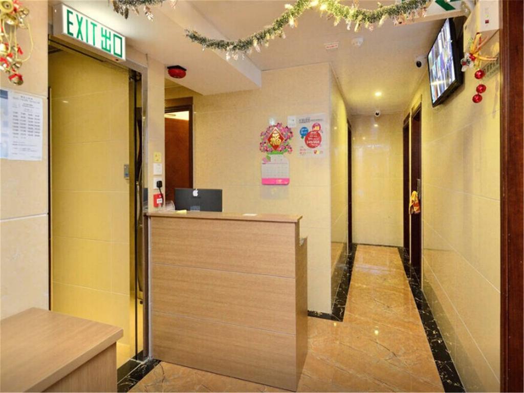 Mingdu Hostel Цзюлун Экстерьер фото