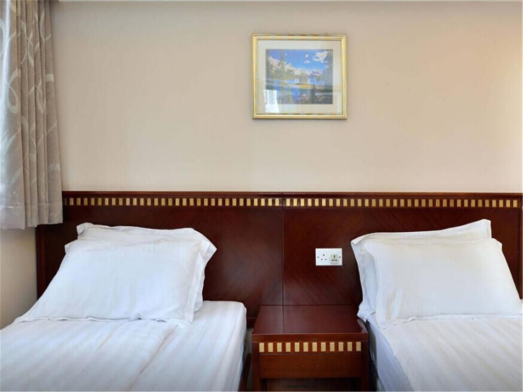 Mingdu Hostel Цзюлун Экстерьер фото