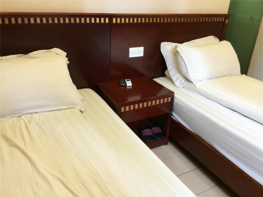 Mingdu Hostel Цзюлун Экстерьер фото