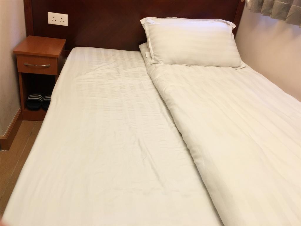 Mingdu Hostel Цзюлун Экстерьер фото