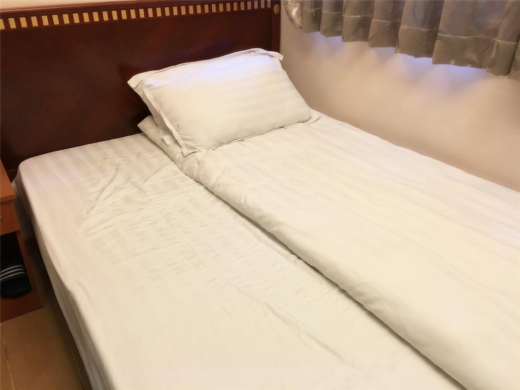 Mingdu Hostel Цзюлун Экстерьер фото