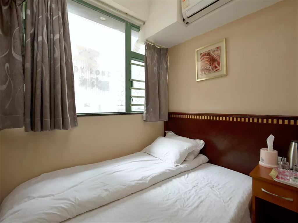 Mingdu Hostel Цзюлун Экстерьер фото