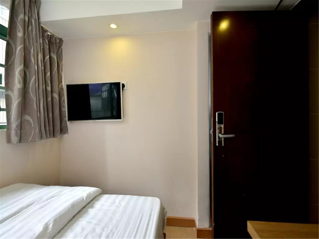 Mingdu Hostel Цзюлун Экстерьер фото