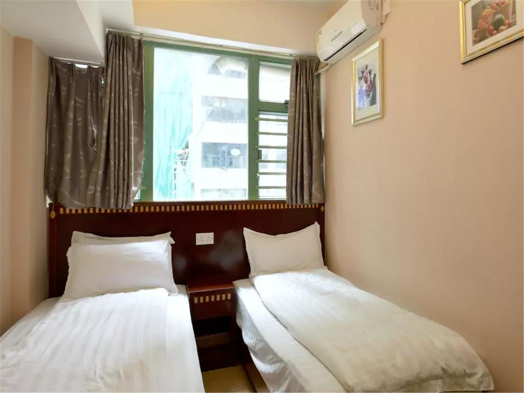 Mingdu Hostel Цзюлун Экстерьер фото