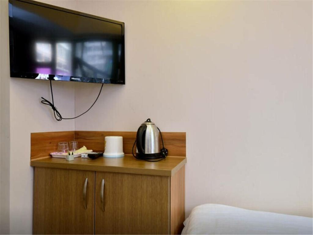 Mingdu Hostel Цзюлун Экстерьер фото