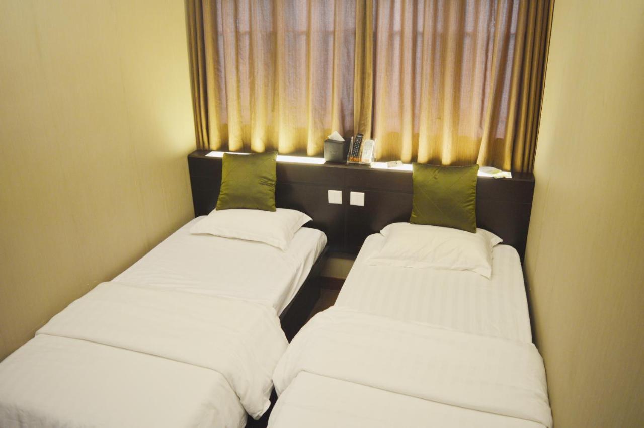 Mingdu Hostel Цзюлун Экстерьер фото